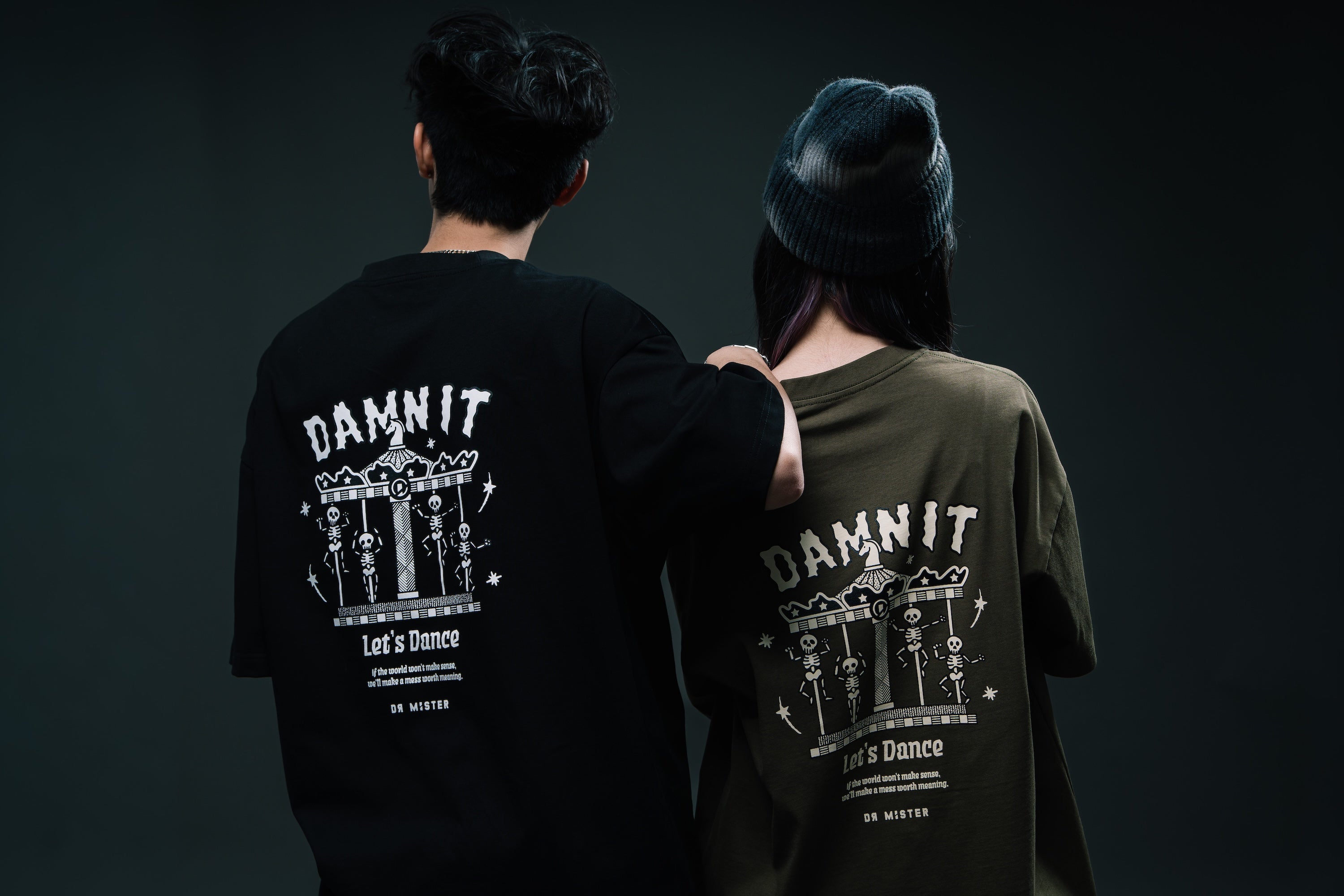 “Damn It” Dancing Tee Back with New Addition